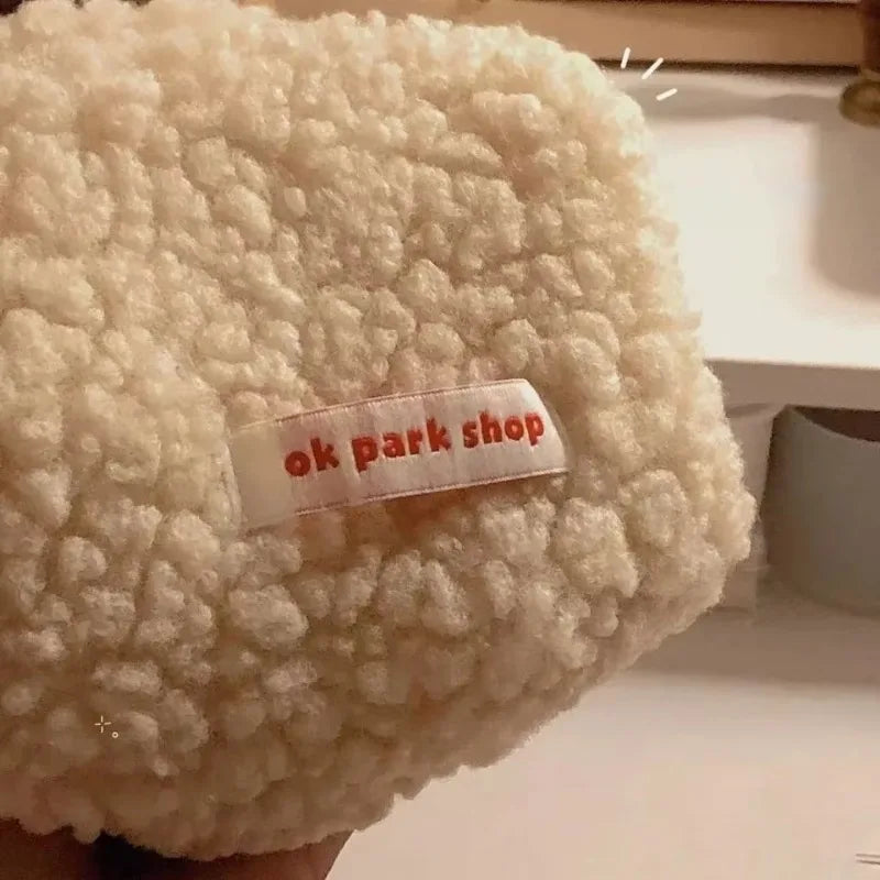 Trousse de toilette en fourrure d'agneau Milk Tea