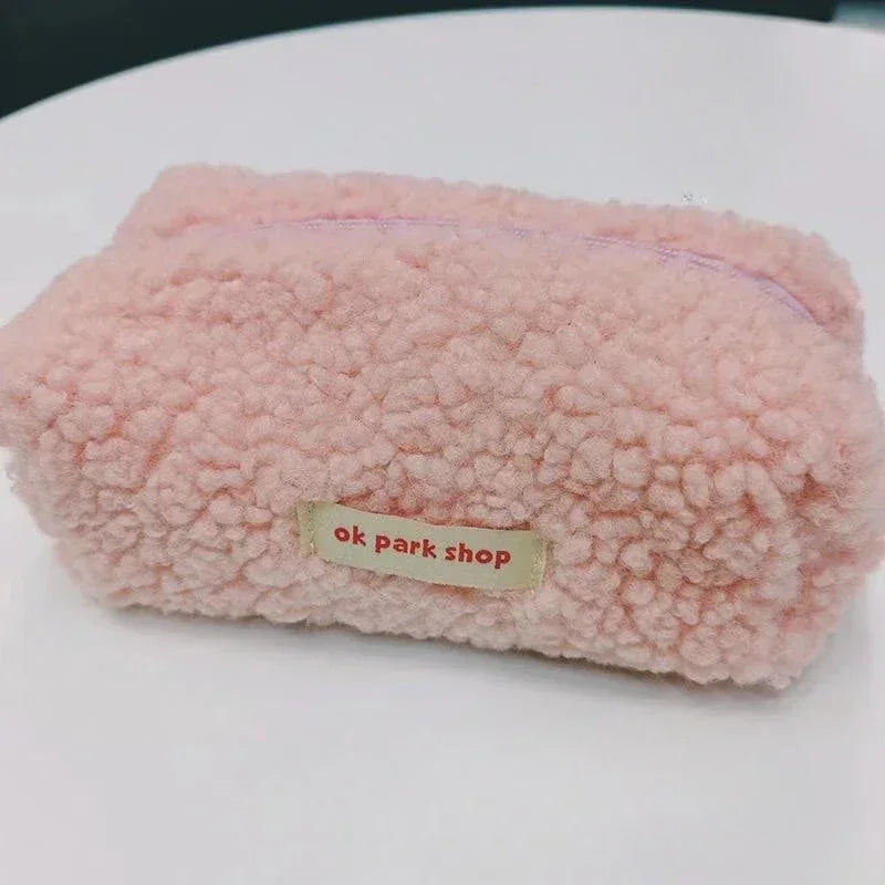 Trousse de toilette en fourrure d'agneau Milk Tea